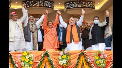 Union Home Minister Amit Shah with chief minister Yogi Adityanath during a public meeting ahead of the UP Assembly elections. They will release the BJP’s Lok Kalyan Sankalp Patra on Sunday. (FILE PHOTO)