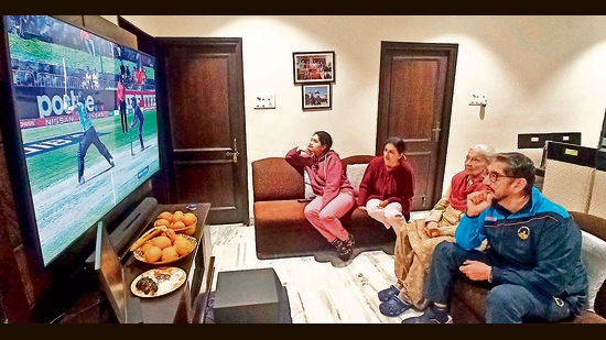 Family members of Rajangad Bawa watching the Under-19 cricket World Cup finals at his residence in Sector 50, Chandigarh, on Saturday night. (Ravi Kumar/HT)