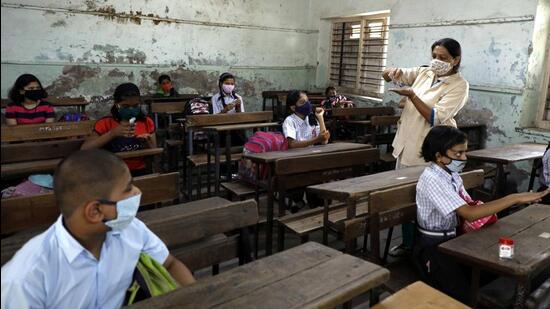 Schools for Classes 1 to 8 will open for regular hours from Monday, deputy chief minister Ajit Pawar said on Saturday. (HT PHOTO)