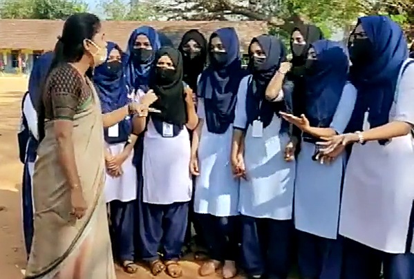 People have argued that in a country where a chief minister can carry a religious title, it is hypocritical to deny Muslim women the right to wear a hijab in public spaces. (ANI) People have argued that in a country where a chief minister can carry a religious title, it is hypocritical to deny Muslim women the right to wear a hijab in public spaces. (ANI)