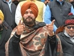 Navjot Singh Sidhu (C) with Former Aam Aadmi Party (AAP) MP from Patiala Dharamvir Gandhi (R) during a press conference in Amritsar. (Photo by Sameer Sehgal /Hindustan Times)