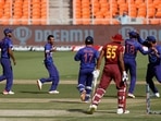 India's Yuzvendra Chahal celebrates the dismissal of West Indies Skipper Kieron Pollard during the first ODI match between India and West Indies, at Narendra Modi Stadium in Ahmedabad on Sunday.(ANI)