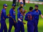 India's Yuzvendra Chahal, center is congratulated by teammates(AP) India's Yuzvendra Chahal, center is congratulated by teammates(AP)