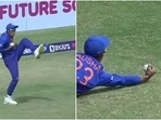 Kaushal Tambe grabs onto the ball to dismiss Rew. Kaushal Tambe grabs onto the ball to dismiss Rew.