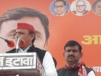 Samajwadi Party president AKhilesh Yadav addresses a rally in Agra on Sunday.(HT Photo)