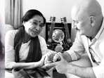 Anupam Kher met Asha Bhosle at Lata Mangeshkar's residence after death of the legendary singer. Anupam Kher met Asha Bhosle at Lata Mangeshkar's residence after death of the legendary singer. 