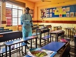 A worker sanitises a classroom at Vidya Bal Bhawan Senior Secondary School in Mayur Vihar, a day before schools in Delhi reopen for students in classes 9 and above. (Amal KS/HT photo) A worker sanitises a classroom at Vidya Bal Bhawan Senior Secondary School in Mayur Vihar, a day before schools in Delhi reopen for students in classes 9 and above. (Amal KS/HT photo)