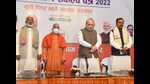 Union Home Minister Amit Shah, Chief Minister Yogi Adityanath, State President Swatantradev Singh and Deputy Chief Minister Keshav Prasad Maurya paying homage to Lata Mangeshkar at BJP state office by keeping a two-minute silence. (Deepak Gupta/HT Photo)
