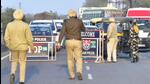 Police personnel controlling the traffic on Ludhiana Ferozepur road to give a way to cavalcade of AICC chief Rahul Gandhi in Ludhiana on Sunday. (HT Photo)