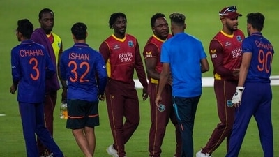 West Indies' players greet Indian players after Indian won the first one day international cricket match in Ahmedabad, India, Sunday, Feb. 6, 2022. (AP) West Indies' players greet Indian players after Indian won the first one day international cricket match in Ahmedabad, India, Sunday, Feb. 6, 2022. (AP)