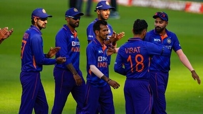 India's Yuzvendra Chahal, center is congratulated by teamates during the first one day international cricket match against West Indies in Ahmedabad, India, Sunday, Feb. 6, 2022. (AP) India's Yuzvendra Chahal, center is congratulated by teamates during the first one day international cricket match against West Indies in Ahmedabad, India, Sunday, Feb. 6, 2022. (AP)