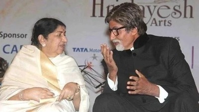 AN old photo of Amitabh Bachchan with late Lata Mangeshkar.