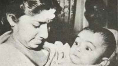 Lata Mangeshkar with Rishi Kapoor in her arms. Neetu Kapoor shared this rare picture while grieving over the death of the legendary singer. Lata Mangeshkar with Rishi Kapoor in her arms. Neetu Kapoor shared this rare picture while grieving over the death of the legendary singer. 