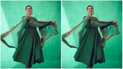 Kirti looked ravishing in a green anarkali salwar with full sleeves and golden resham thread details above the waist. She paired it with a green pair of satin trousers with intricate embroidery near the borders. Kirti completed her look with a satin green dupatta with gold and yellow zari details at the borders. (Instagram/@iamkirtikulhari)