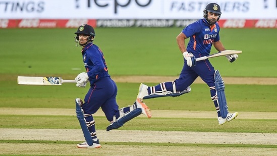 India's Rohit Sharma and Ishan Kishan run between wickets during the first ODI cricket match between India and West Indies, at the Narendra Modi Stadium, in Ahmedabad, Sunday, Feb 6, 2022. (PTI)