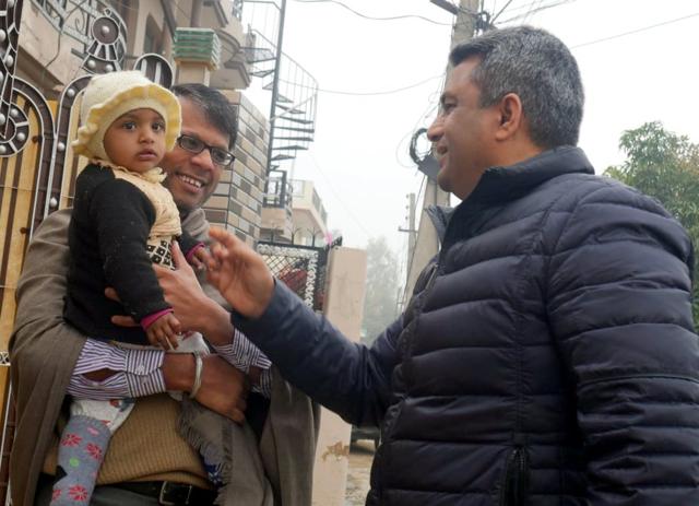 BJP candidate Sanjeev Vashisht meeting voters at Sambhalki village in Mohali. (HT)
