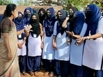 People have argued that in a country where a chief minister can carry a religious title, it is hypocritical to deny Muslim women the right to wear a hijab in public spaces. (ANI) People have argued that in a country where a chief minister can carry a religious title, it is hypocritical to deny Muslim women the right to wear a hijab in public spaces. (ANI)