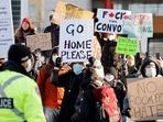 Demonstrators stage a counter-protest at city hall as truckers and supporters continue to protest against the coronavirus disease (COVID-19) vaccine mandates, in Ottawa, Ontario, Canada.