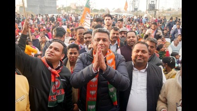 BJP candidate Sanjeev Vashisht campaigning in Mohali on Monday, ahead of the Punjab assembly elections. (HT Photo)