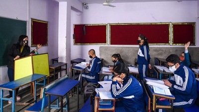 Students attend a class at a school in Mayur Vihar on Monday. (Amal KS/HT) Students attend a class at a school in Mayur Vihar on Monday. (Amal KS/HT)
