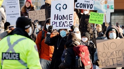 Demonstrators stage a counter-protest at city hall as truckers and supporters continue to protest against the coronavirus disease (COVID-19) vaccine mandates, in Ottawa, Ontario, Canada. (REUTERS)