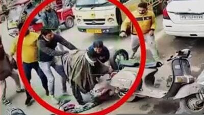 CCTV grab of the incident where a man tried to hack a woman to death in Ludhiana and was overpowered by passersby. (HT Photo) CCTV grab of the incident where a man tried to hack a woman to death in Ludhiana and was overpowered by passersby. (HT Photo)