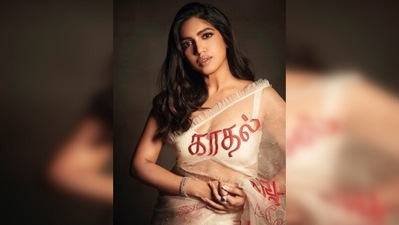 Bhumi Pednekar kept her look simple by pairing it with a sleeveless ivory blouse with a plunging neckline. (Instagram/@bhumipednekar) Bhumi Pednekar kept her look simple by pairing it with a sleeveless ivory blouse with a plunging neckline. (Instagram/@bhumipednekar)