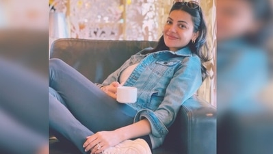 In another photo, captured by her husband, Kajal Aggarwal can be seen relaxing on a couch wearing a denim jacket, blue trousers and white sneakers. (Instagram/@kajalaggarwalofficial) In another photo, captured by her husband, Kajal Aggarwal can be seen relaxing on a couch wearing a denim jacket, blue trousers and white sneakers. (Instagram/@kajalaggarwalofficial)
