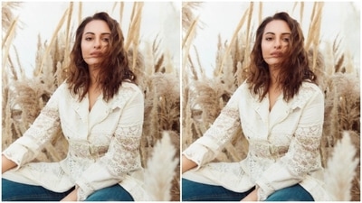 Sonakshi looked gorgeous in a white jacket, minimally embroidered in white resham threads and multicolour prints. She paired it with blue denims as she looked directly at the camera. (Instagram/@aslisona)