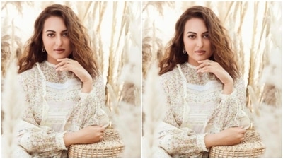 Sonakshi gave a twist to white fashion in a white dress, minimally printed with multicolour, with a white resham thread detail above the waist. In wavy curls and minimal makeup, Sonakshi aced this look. (Instagram/@aslisona)