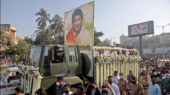 Lata Mangeshkar's funeral procession in Mumbai. (REUTERS) Lata Mangeshkar's funeral procession in Mumbai. (REUTERS)