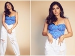 The trailer of Bhumi Pednekar and Rajkummar Rao's Badhaai Do has created a curiosity among moviegoers. The film is going to hit theatres on February 11 and actor Bhumi Pednekar is going all out to promote her film. For a recent promotional event, Bhumi was spotted wearing a blue bustier corset teamed with ripped high rise mom jeans.(Instagram/@bhumipednekar)