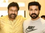 Chiranjeevi with his son Ram Charan. Chiranjeevi with his son Ram Charan.