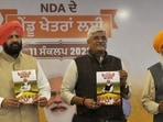 Gajender Singh Shekhawat, Sukhdev Singh Dhindsa and other leaders during launch of manifesto for rural areas of Punjab during joint press conference in Chandigarh on Tuesday.(Keshav Singh/Hindustan Times)