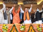 Union Home Minister Amit Shah with chief minister Yogi Adityanath during a public meeting ahead of the UP Assembly elections. (FILE PHOTO)
