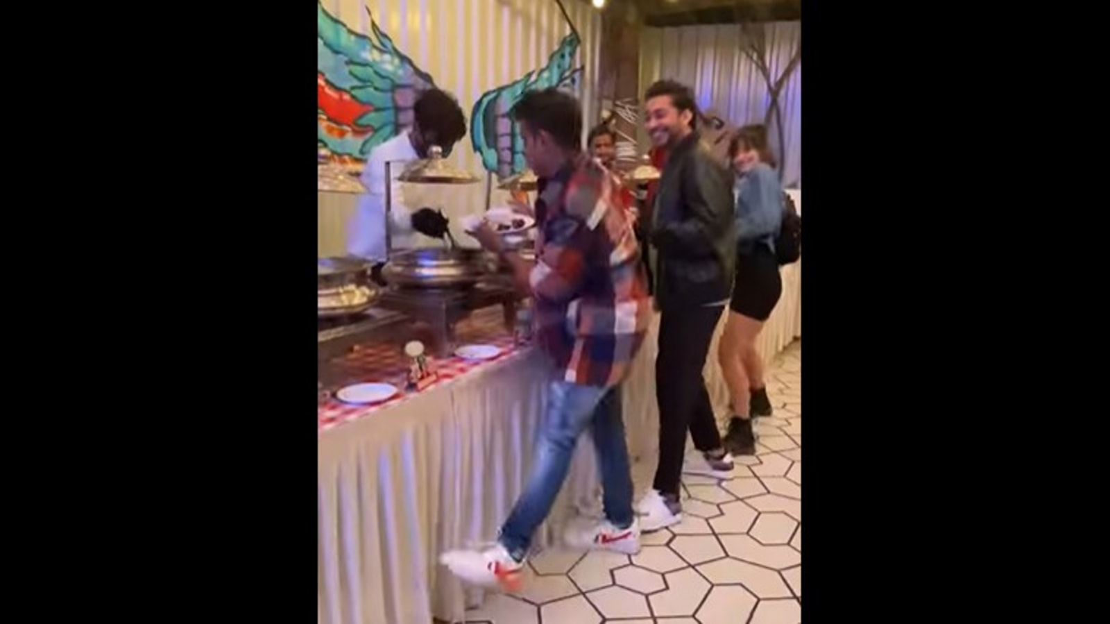 Dancers do Allu Arjun’s Srivalli hook step as they get food at a buffet. Watch | Trending