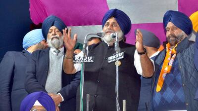 Shiromani Akali Dal president Sukhbir Singh Badal (centre) campaigning for party candidate Maheshinder Singh Grewal (right) at a public meeting in Jawaddi, Ludhiana, on Tuesday evening. (Gurpreet Singh/HT) Shiromani Akali Dal president Sukhbir Singh Badal (centre) campaigning for party candidate Maheshinder Singh Grewal (right) at a public meeting in Jawaddi, Ludhiana, on Tuesday evening. (Gurpreet Singh/HT)