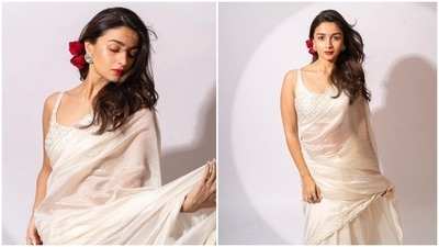 Alia Bhatt recently launched the trailer of her upcoming film Gangubai Kathiawadi which received mixed reviews online. The actor has been dedicatedly promoting her film as the release date nears. All her promotional outfits have been syncing with her film's character. In her recent set of Instagram stills, the Highway actor can be seen draped in a timeless ivory saree by Punit Balana. (Instagram/@stylebyami) Alia Bhatt recently launched the trailer of her upcoming film Gangubai Kathiawadi which received mixed reviews online. The actor has been dedicatedly promoting her film as the release date nears. All her promotional outfits have been syncing with her film's character. In her recent set of Instagram stills, the Highway actor can be seen draped in a timeless ivory saree by Punit Balana. (Instagram/@stylebyami)