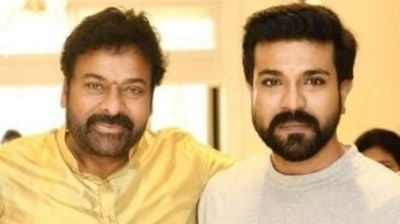Chiranjeevi with his son Ram Charan. Chiranjeevi with his son Ram Charan.