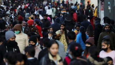 People shop at a market amidst the spread of coronavirus disease (Covid-19) in New Delhi.&nbsp; (REUTERS files)