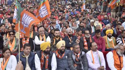 While Ludhiana is recovering from the pandemic’s deadly blow over the past few weeks, Covid protocols, including masks and social distancing, continue to be flouted, as seen at the virtual rally of Prime Minister Narendra Modi at Clock Tower Chowk on Tuesday. (Gurpreet Singh/HT) While Ludhiana is recovering from the pandemic’s deadly blow over the past few weeks, Covid protocols, including masks and social distancing, continue to be flouted, as seen at the virtual rally of Prime Minister Narendra Modi at Clock Tower Chowk on Tuesday. (Gurpreet Singh/HT)