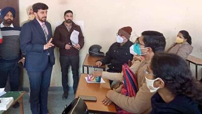 Election staff attending a training session in Ludhiana ahead of the upcoming Punjab assembly elections. (HT Photo)