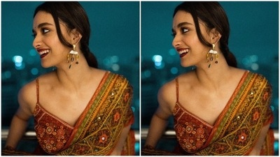 Keerthy rounded off her ensemble by draping a heavily embroidered phulkari dupatta on her shoulders. It comes with intricate thread work, mirror embellishments and printed patterns done in shades of yellow, mustard, green, brown and orange on a red background. (Instagram/@keerthysureshofficial) Keerthy rounded off her ensemble by draping a heavily embroidered phulkari dupatta on her shoulders. It comes with intricate thread work, mirror embellishments and printed patterns done in shades of yellow, mustard, green, brown and orange on a red background. (Instagram/@keerthysureshofficial)