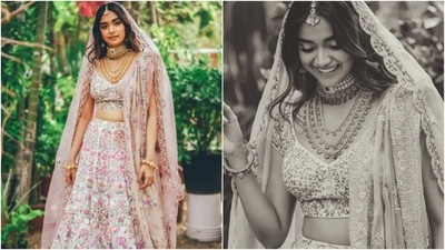 Earlier, Keerthy's stylist had posted pictures of the star wearing a pink floral lehenga set. The traditional ensemble was from the shelves of ace couturier Rahul Mishra and came bedecked with embroidery done in multiple hues. (Instagram/@archamehta) Earlier, Keerthy's stylist had posted pictures of the star wearing a pink floral lehenga set. The traditional ensemble was from the shelves of ace couturier Rahul Mishra and came bedecked with embroidery done in multiple hues. (Instagram/@archamehta)