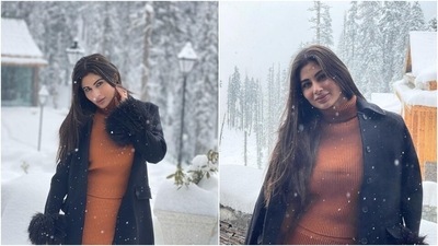 The pictures show Mouni posing for Suraj with a big smile on her face, enjoying the snow, and serving fashion goals in chic attire. The Brahmastra actor opted for a monotone outfit to enjoy the day. She teamed it with a trench coat to protect herself from the cold. (Instagram/@imouniroy)