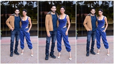 Deepika Padukone posed with her co-star Siddhant Chaturvedi who looked dapper in his black t-shirt shirt, ripped denims, tanned jacket and sneakers. (HT Photo/Varinder Chawla)