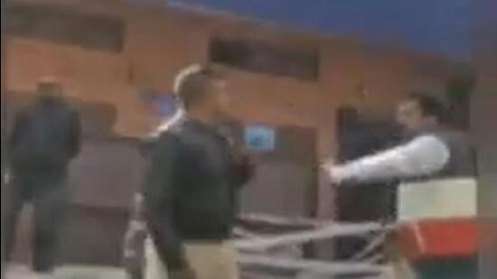A video surfaced on social media purportedly showed two police personnel beating the journalist and trying to drag him into their vehicle. (Video grab) A video surfaced on social media purportedly showed two police personnel beating the journalist and trying to drag him into their vehicle. (Video grab)