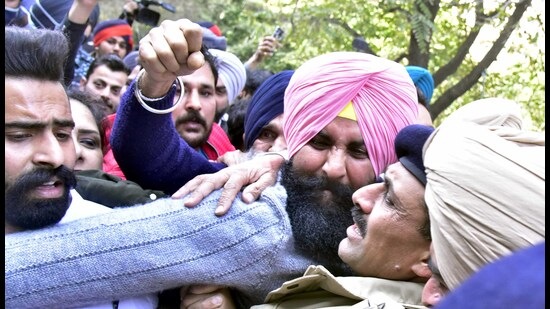 Lok Insaaf Party chief and MLA Simarjeet Singh Bains being taken away by the police from the Ludhiana Court Complex on Tuesday. (Gurpreet Singh/HT)