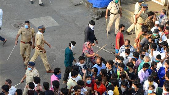 Migrant workers gather in large number at Mumbai’s Bandra on April 14 2020 demanding transport to return to their native place after it was announced that the 21-day Covid-19 lockdown imposed on March 24 will be extended (HT File Photo/Zoya Loba)