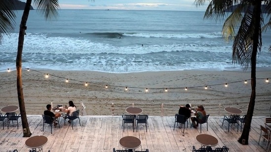 People dine-in at a restaurant following social distancing measures, as Langkawi gets ready to open to domestic tourists from September 16, amid the coronavirus disease (COVID-19) outbreak, Malaysia September 13, 2021. REUTERS/Lim Huey Teng/File Photo